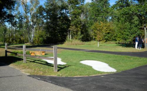 See Paul Bunyan's footprints at the park in Breezy Point.