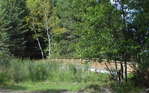 A pedestrian bridge over Hay Creek at Veteran's Walking Trail