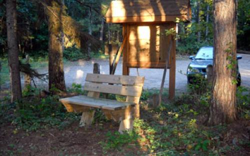 A resting bench at the Vets Trail kiosk provides a lovely spot to contemplate natures bounty.