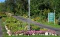 Entrance gardens to Pelican Woods Cemetery