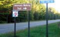 Byway site marker indicates location of the Veterans Walking Trail along CSAH 16