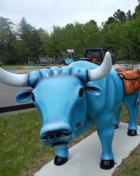 Babe the Blue Ox is a welcome sight in the garden, his saddlebags stuffed with vegetables.
