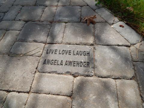 Memorial brick paver installed in the pathway Memorial brick paver installed in the pathway