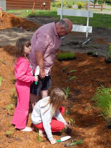 Day of Caring Volunteers at Linda Ulland Memorial Gardens May 4, 2022