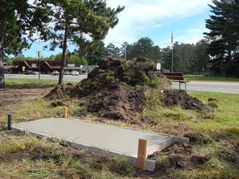 Sculpture and bench footings poured image 4