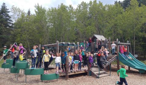 Kindergarten students from Crosby Schools have a field trip to the U. S. Army Corps of Engineers Crosslake Recreation Area playground after listening to stories read to them by Paul Bunyan. Kindergarten students from Crosby Schools have a field trip to the U. S. Army Corps of Engineers Crosslake Recreation Area playground after listening to stories read to them by Paul Bunyan.