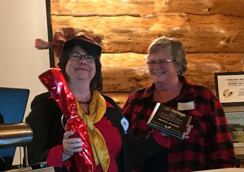 Scenic Byway Chair, Cindy Nelson awarded Member/volunteer Mary Plein with a special "No Tall Tale" Award for her Bunyan-sized efforts supporting the Byway. Scenic Byway Chair, Cindy Nelson awarded Member/volunteer Mary Plein with a special "No Tall Tale" Award for her Bunyan-sized efforts supporting the Byway.